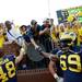 Michigan fans shake hands with players as they celebrate beating Central Michigan 59-9 at Michigan Stadium on Saturday, August 31, 2013. Melanie Maxwell | AnnArbor.com